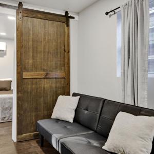 Living room with couch and door