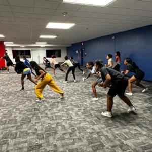 People dancing in an exercise room