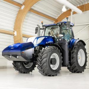A blue tractor in a garage