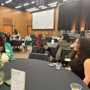 people talk at tables