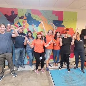 A group of volunteers posing for a photo
