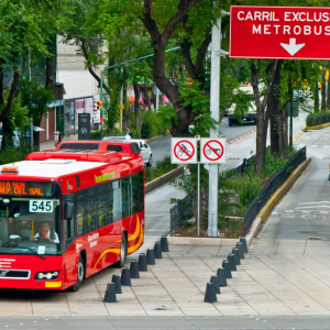 Bus driving down the street