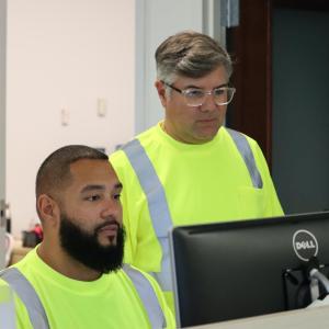 Covia employees Vincent and Rick working on the computer