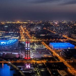 Beijing at night lit up in blue and orange lights