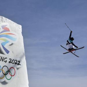 skier jumping off ramp