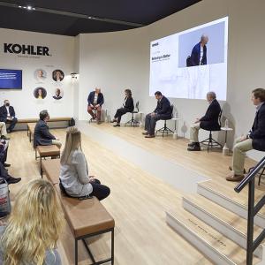 panel of speakers with audience