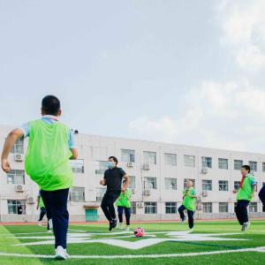 Students Play on Recycled Field