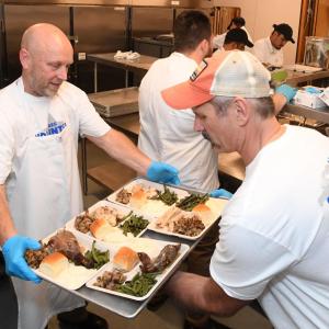 AEG employees served 500 Thanksgiving meals, prepared by Wolfgang Puck Catering, to local families in need at the 11th annual Community Thanksgiving celebration at the Novo LA LIVE in Los Angeles, CA.  