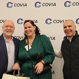 Three smiling people