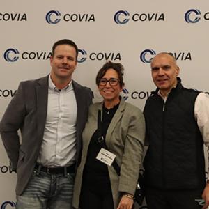 Three smiling people