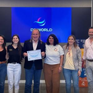 DP World employees in Argentina hold a certificate recognizing the successful recertification of 10 United Nations Sustainable Development Goals.
