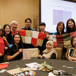 A group of people working on a project together