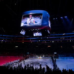 Singer Matty Gottesman, a victim of the Palisades Fire, sang the national anthem. 