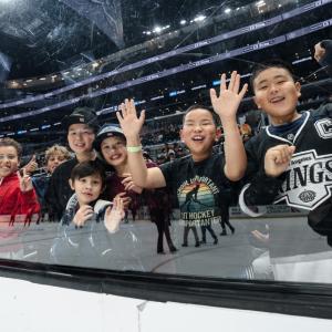 Attendees smiled as they enjoyed the game.