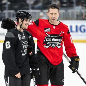 Justin Bieber, Singer, and Terry Ryan, Professional hockey player, helped support the LA Kings Skate for LA Strong hockey game.