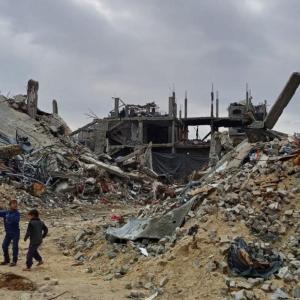 Children amongst sand and rubble