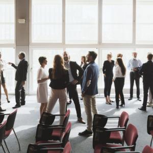 Group of conference attendees mingling