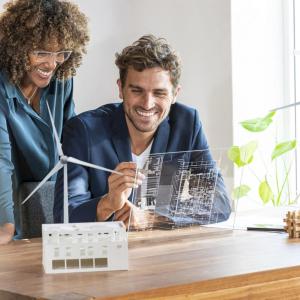 2 people looking at futuristic computer