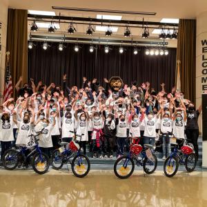students with their bicycles