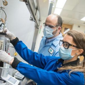 Workers in a biomedical lab