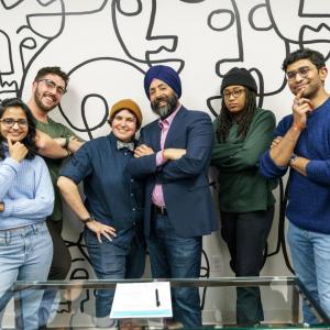 GoDaddy CEO Aman Bhutani and employee resource group members gather for Aman to sign the CEO Action for Diversity & InclusionTM pledge to advance diversity and inclusion in the workplace.