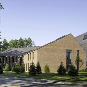 Bowdoin College - Exterior of Mills Hall & Gibbons Center for Arctic Studies with pine grove