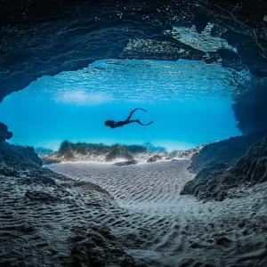 underwater shot of Gádor snorkeling with swim fins