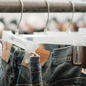 jeans hanging on a sales rack