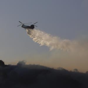The Coulson-Unical CH-47 helitanker dropping water