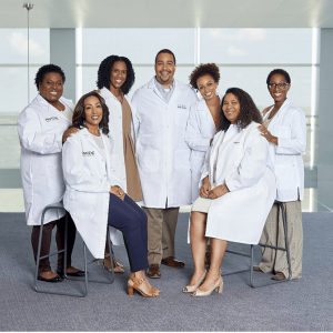 Group of people in lab coats