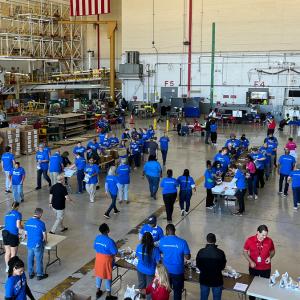 Volunteers helping to pack boxes 
