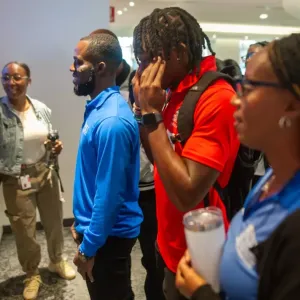 People looking at computer screens 