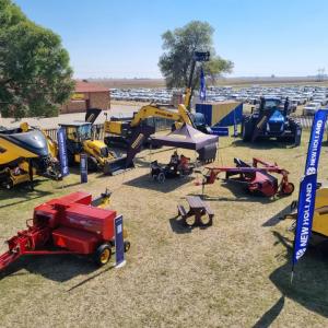 Agricultural machinery on display in a field at NAMPO 2024