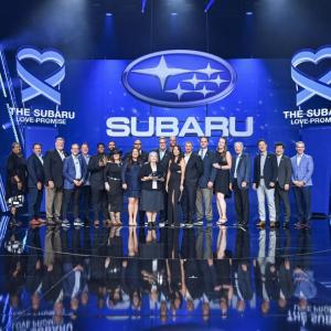 People standing together on a stage