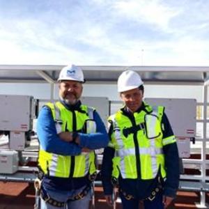 Raul Faudoa and Octavio Bocanegra pose at Toluca, Mexico solar installation site. 