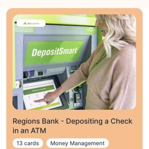 A person depositing a check in an ATM
