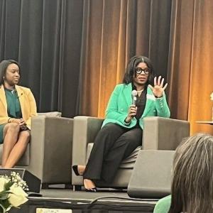 Someone speaking on a stage