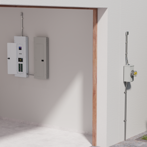 A wall unit inside a garage, and an electric meter attached to the outside a house