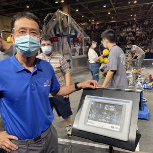 Rockwell’s Zhongjie Li serving as a judge at a FIRST® Robotics Competition in Hangzhou, China.   