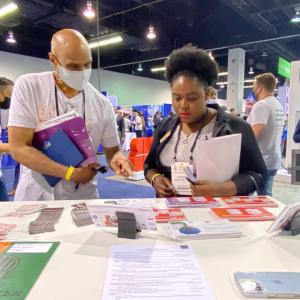 Rockwell’s Derek Gallon chats with a NSBE attendee.