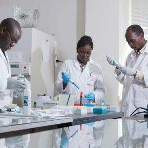 three scientists in lab