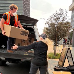 Direct Relief volunteers unloading 3M N95 Respirators in LA.
