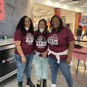 (L-R): Rockwell’s Dominique Roberts volunteered with her niece and sister.  
