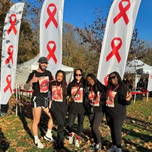 People standing together on the grass