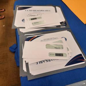 Certificates on a table.