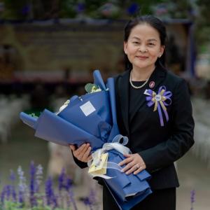 person holds bouquet of flowers