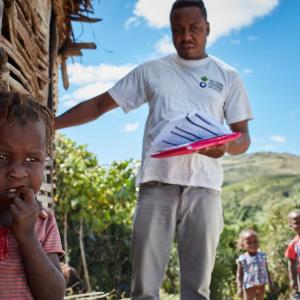 Action Against Hunger’s medical team visits a patient’s home in Haiti.