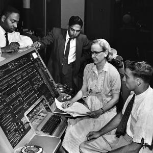 Grace Hopper, American computer scientist, at an early computer