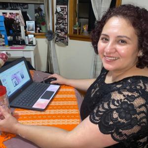 Person sitting with laptop