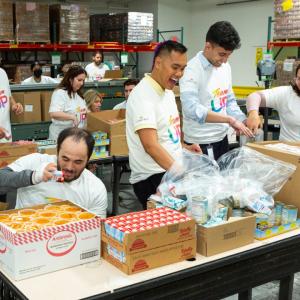 Volunteers packing boxes
